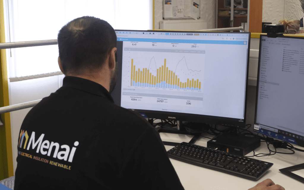 Menai technician assessing our customers' energy monitoring systems 3